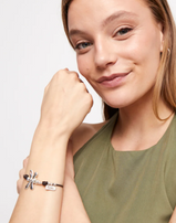 Bracciale UNOde50 di cuoio con libellula placcato argento sterling Ref. PUL2479