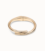 Bracciale UNOde50 placcato oro 18k di forma tubolare e molla nascosta Ref. PUL2187